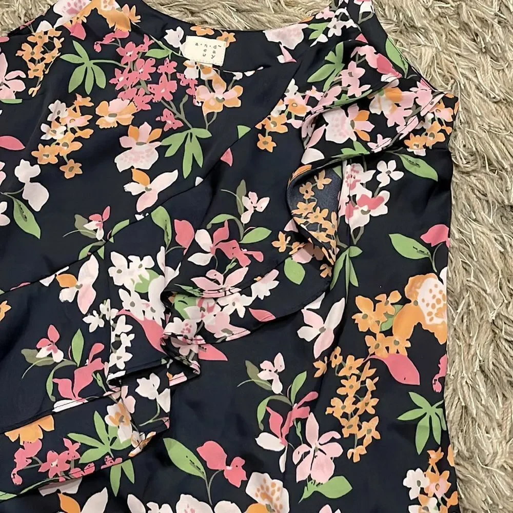 A New Day Floral Tank‎ w/ruffle in front. Size XS